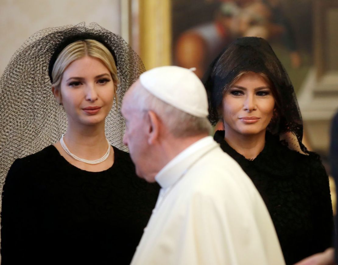 Pope Francis walks past US First Lady Melania Trump and the daughter of US President Donald Trump Ivanka Trump at the end of a private audience at the Vatican on May 24, 2017.