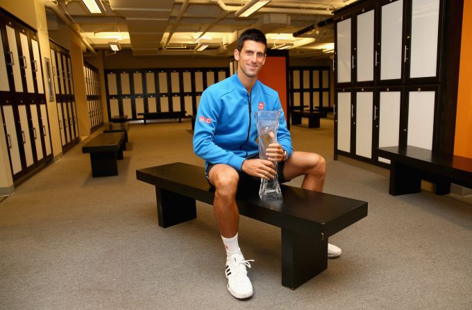 As well as a place of preparation for matches, locker rooms are also a perfect setting for posing for photos after winning trophies. Novak Djokovic is pictured holding the Butch Bucholz trophy after winning his fifth Miami Open title in 2015.