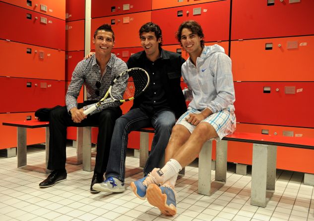Access is normally restricted to players and coaches only, though exceptions can be made. Real Madrid icons Cristiano Ronaldo (L) and Raul are pictured posing with Nadal during the Madrid Masters in May 2010.