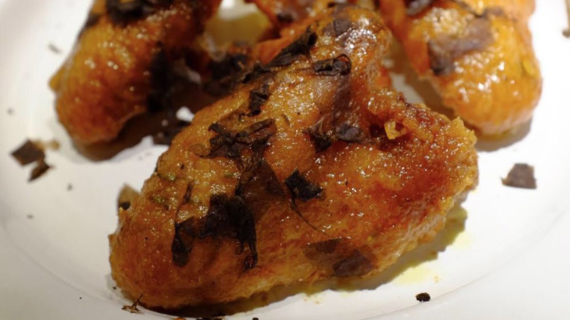 Fragrant black truffle chicken wings -- one of the dishes on Neighborhood's small menu.