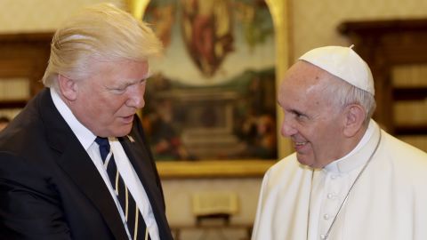 Pope Francis exchanges gifts with President Donald Trump during a private audience at the Vatican.