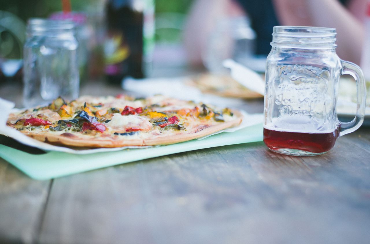 It wouldn't be a trip to Rome without a slice of pizza.