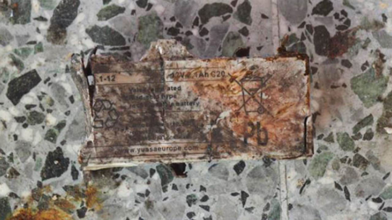 A label, possibly from a 12-volt battery that may have been the power source for the bomb, The New York Times reported.