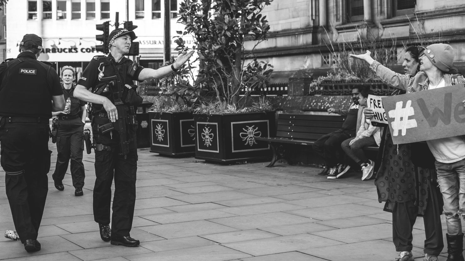 police blowing kisses manchester picture