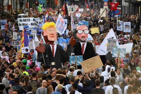 Protesters in Brussels demonstrate with effigies of Trump and Michel on May 24.