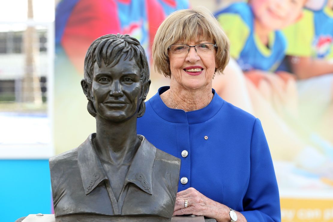 Margaret Court poses with a bronze bust of herself during the 2015 Australian Open at Melbourne Park.