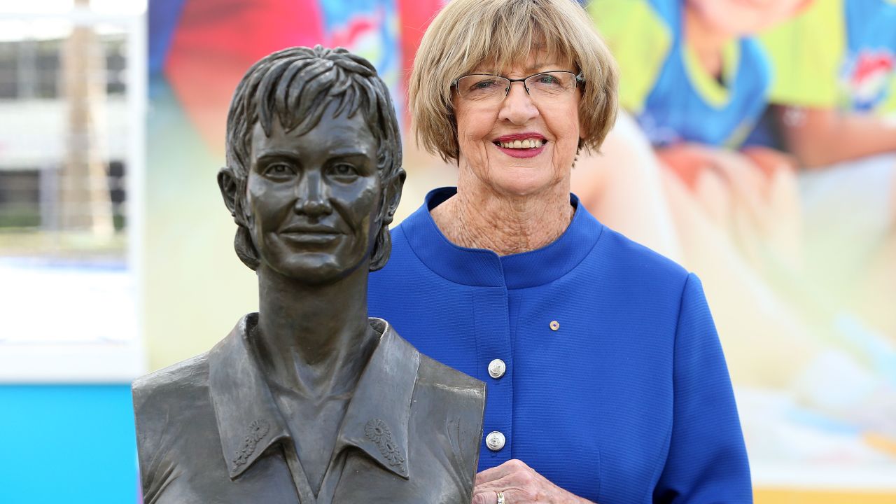 Margaret Court poses with a bronze bust of herself during the 2015 Australian Open at Melbourne Park.