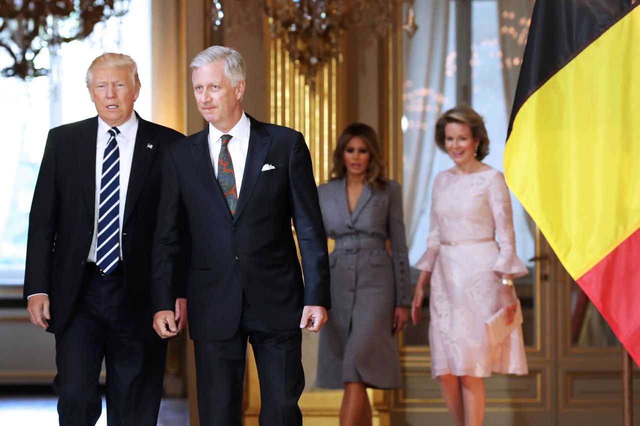 Trump speaks with King Philippe of Belgium as Queen Mathilde and Melania Trump chat during a reception at the Royal Palace in Brussels on Wednesday, May 24.