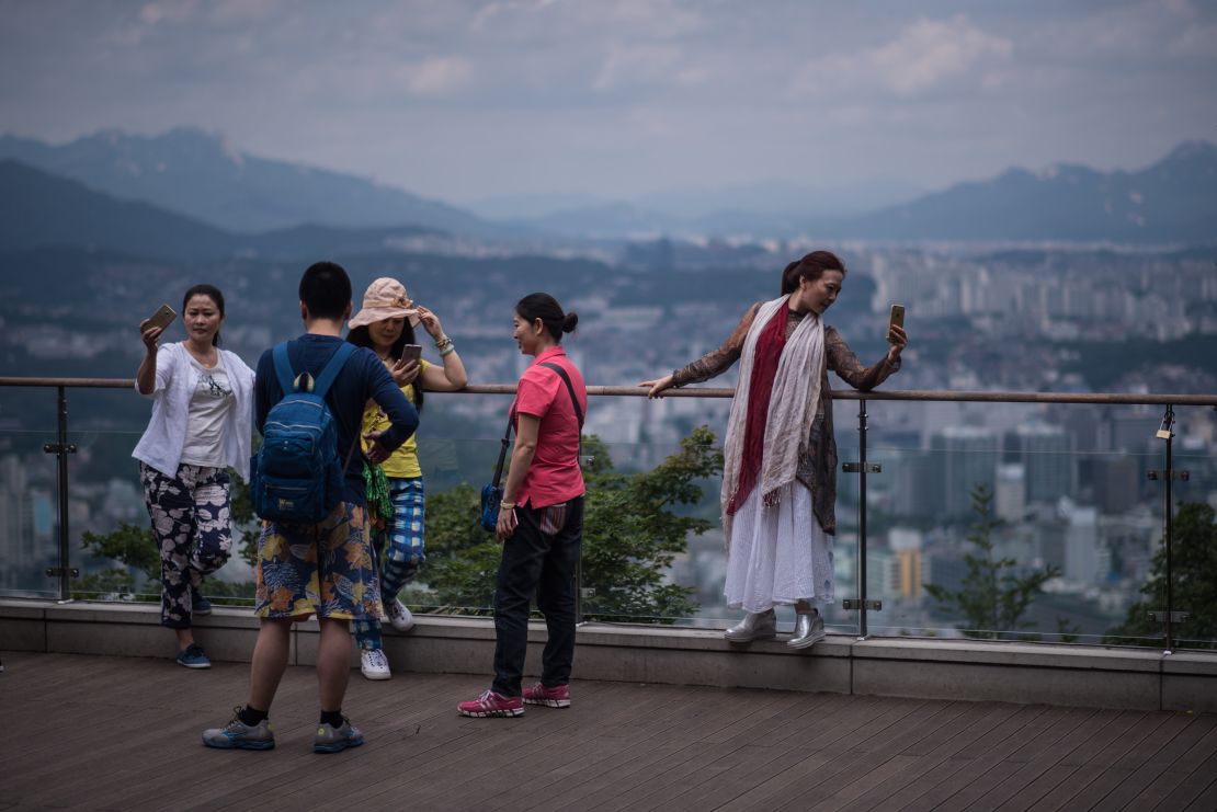 Tourists and sightseers on the landmark N Seoul Tower -- also known as the Namsan Tower.