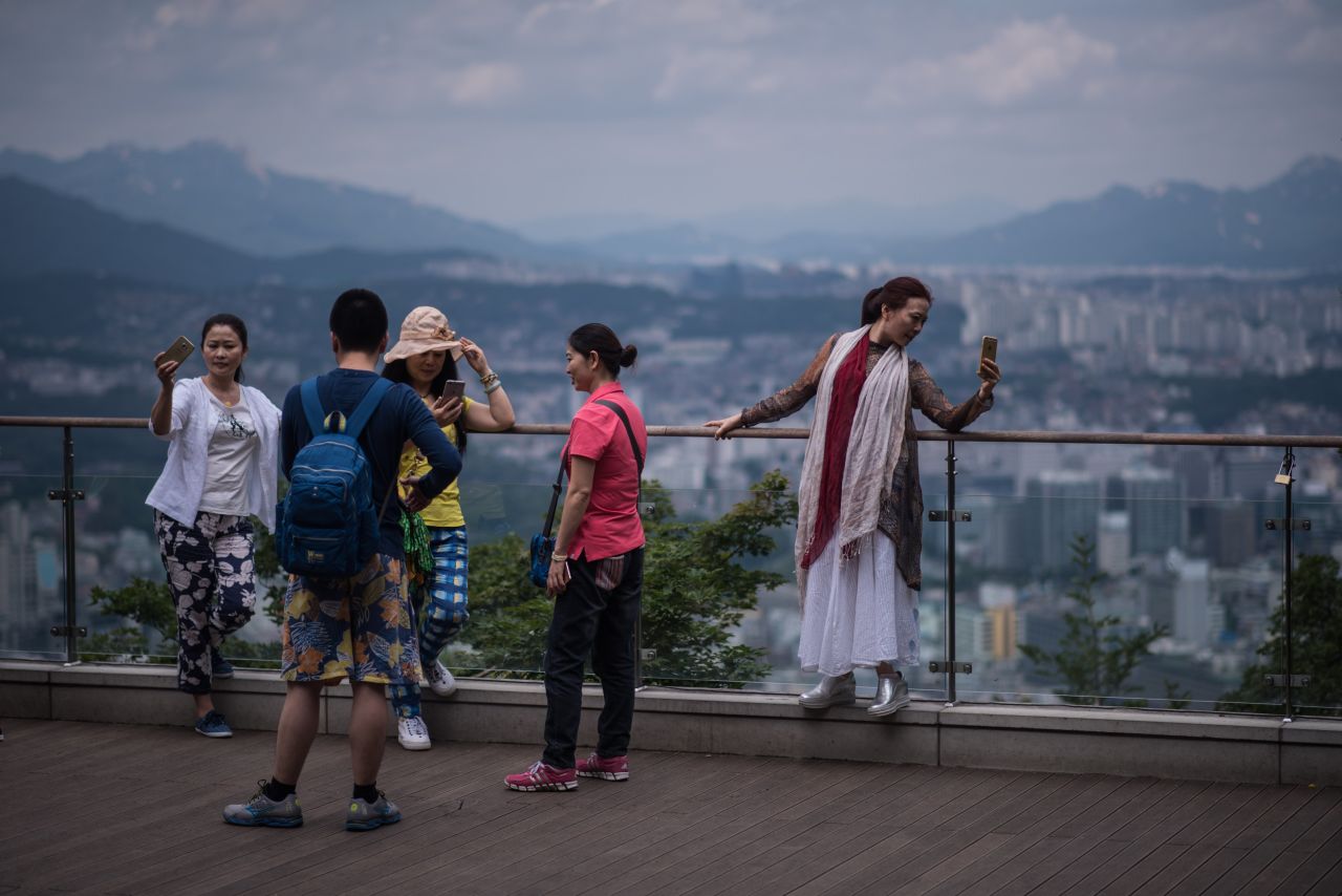 Tourists and sightseers on the landmark N Seoul Tower -- also known as the Namsan Tower.