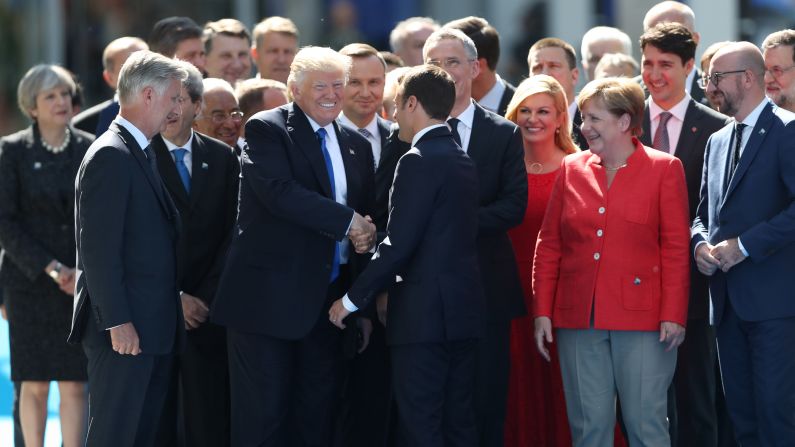 Trump shakes hands with Macron in Brussels, Belgium, on Thursday, May 25. They were attending <a href="index.php?page=&url=http%3A%2F%2Fwww.cnn.com%2F2017%2F05%2F25%2Fpolitics%2Ftrump-nato-financial-payments%2F" target="_blank">a NATO summit</a> as the alliance officially opened a new $1 billion headquarters.