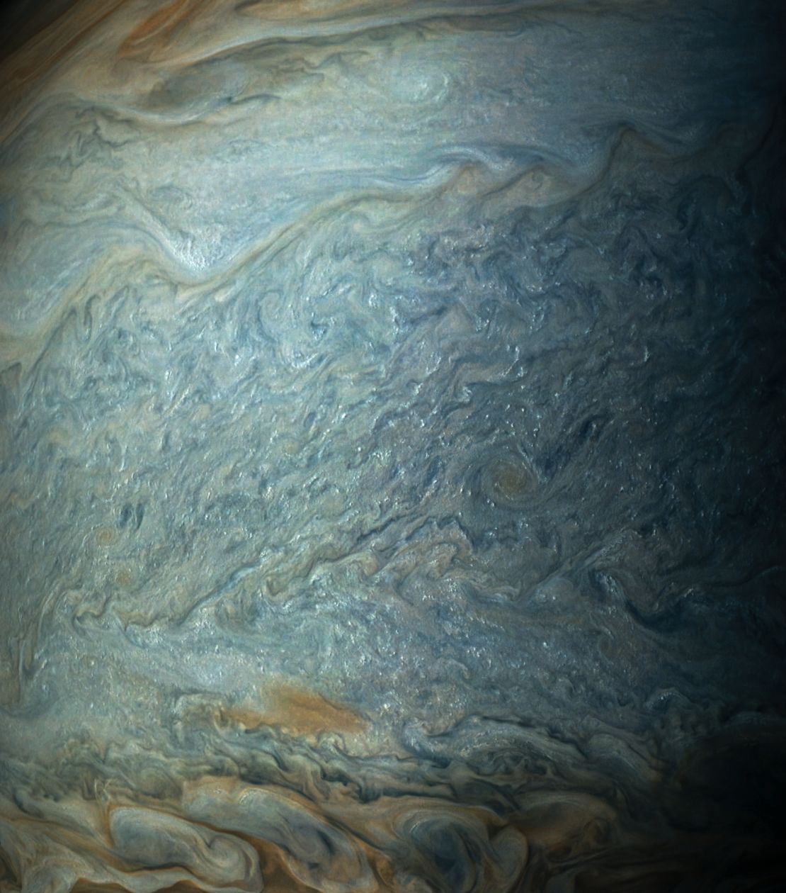A close-up of the bright clouds that dot Jupiter's south tropical zone, as seen by NASA's Juno spacecraft.