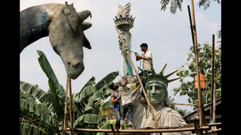 <strong>Jakarta: </strong>Workers construct a large-scale replica of the Statue of Liberty which is due to be installed at a public park in Jakarta. The sculpture is reported to have cost around $17,000. 
