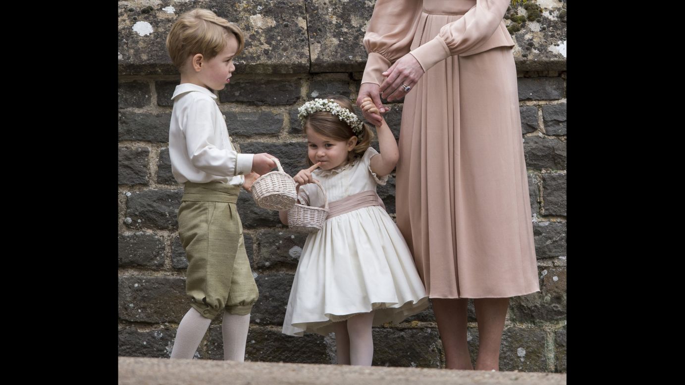 Britain's Prince George, left, and his little sister, Princess Charlotte, attend <a href="http://www.cnn.com/2017/05/20/world/pippa-middleton-wedding-day/" target="_blank">the wedding</a> of their aunt, Pippa Middleton, on Saturday, May 20. George was a page boy in the wedding. Charlotte was a flower girl.