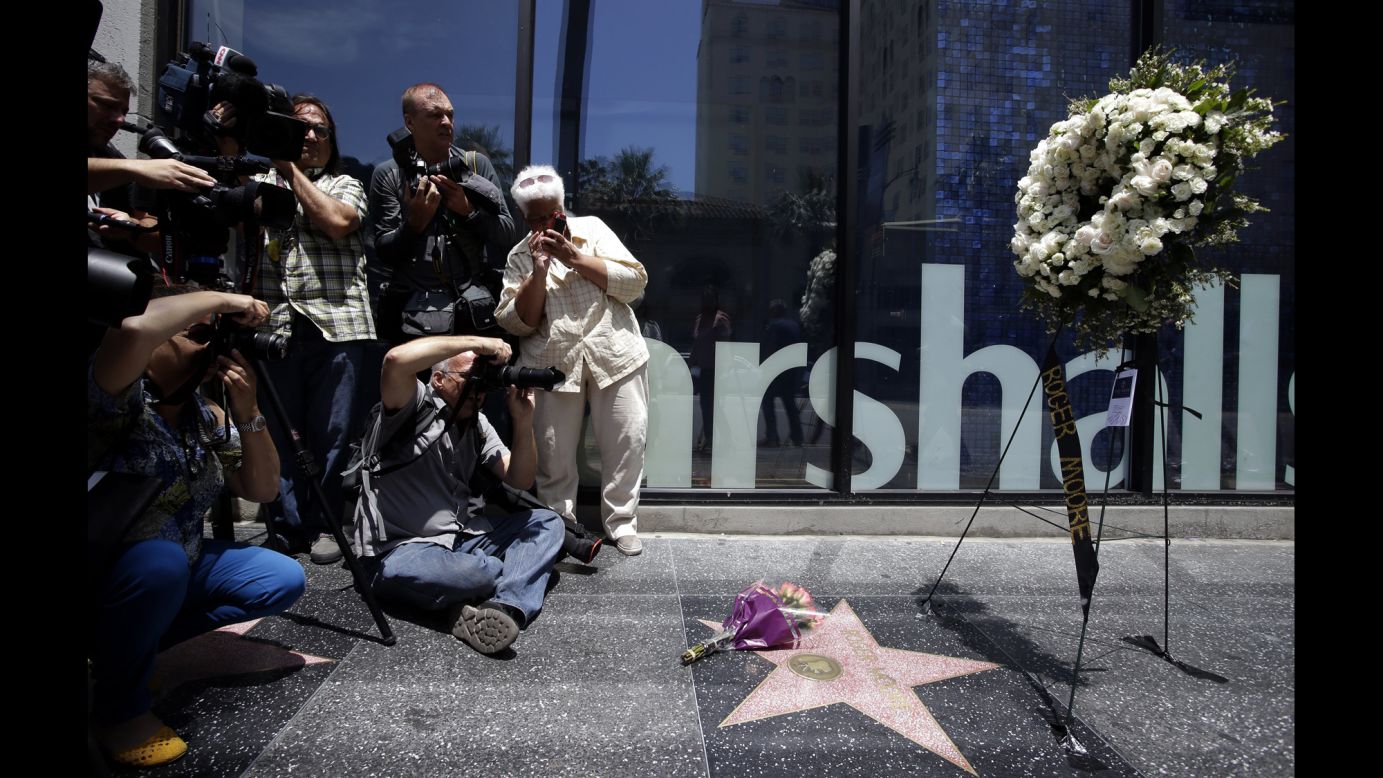 Photographers take pictures of Roger Moore's star on the Hollywood Walk of Fame on Tuesday, May 23. Moore, the English actor famous for portraying James Bond in seven films between 1973 and 1985, <a href="http://www.cnn.com/2017/05/23/entertainment/roger-moore-dies/index.html" target="_blank">died Tuesday</a> after a battle with cancer, according to his family. He was 89. <a href="http://www.cnn.com/2017/05/23/entertainment/gallery/roger-moore/index.html" target="_blank">See more photos from his career</a>