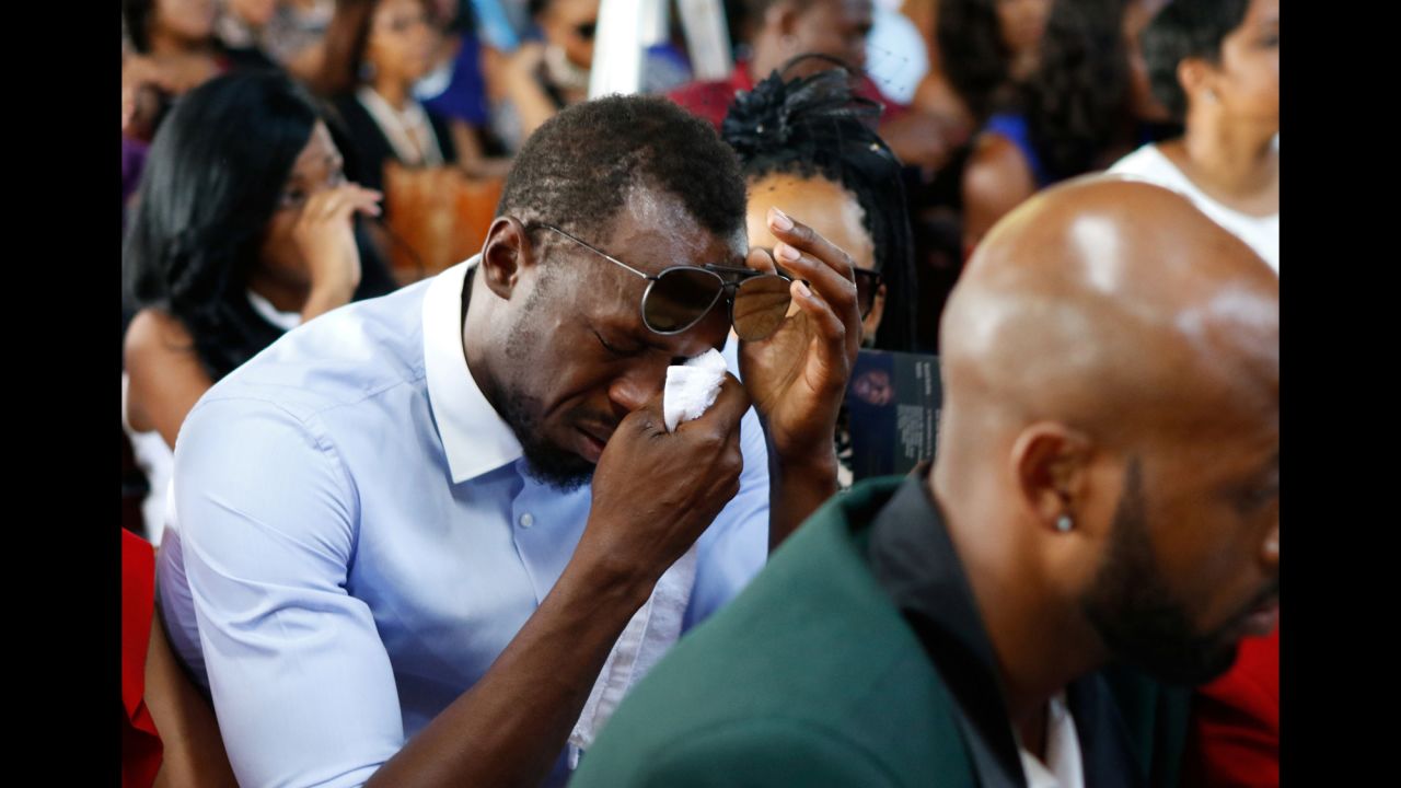 Olympic champion Usain Bolt, the world's fastest man, cries during a funeral service for high-jumper Germaine Mason on Sunday, May 21. Mason, an Olympic silver medalist, was killed in a motorbike crash last month on the outskirts of Kingston, Jamaica.