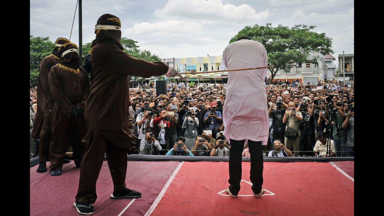 A man is publicly caned outside a mosque in Banda Aceh, Indonesia, on Tuesday, May 23. <a href="http://www.cnn.com/2017/05/23/asia/indonesia-caning-homosexuality/" target="_blank">Two men were caned 83 times</a> as a punishment for having homosexual sex in Indonesia's ultra-conservative Aceh province.