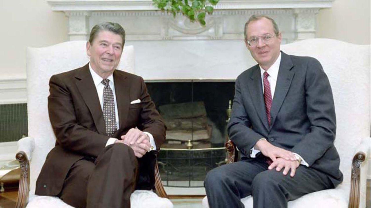 Kennedy meets with President Reagan in the Oval Office.