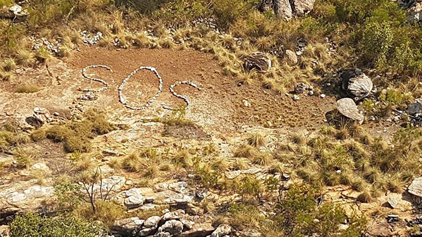 A mystery SOS sign spotted by a pilot has prompted fears of missing people in Australia. 