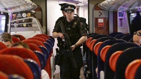 Armed police officers are patroling on board trains nationwide for the first time.
