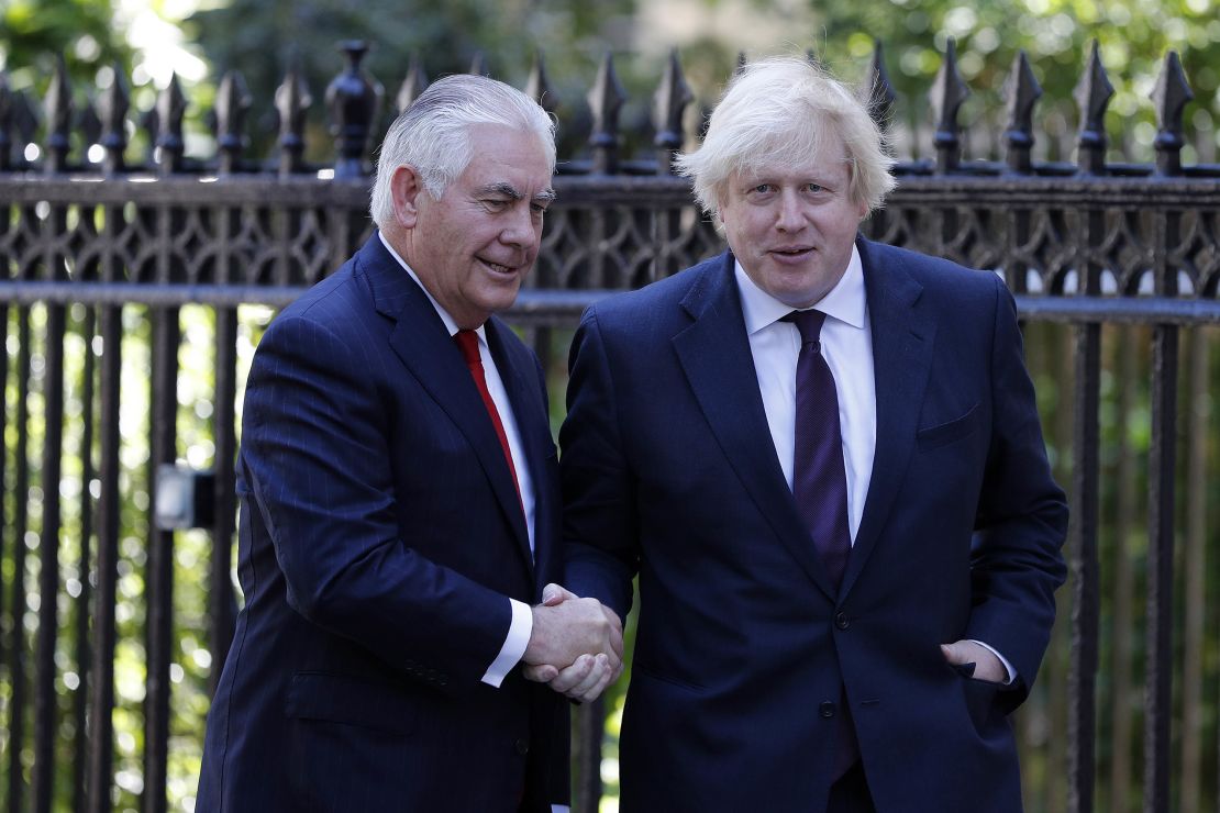UK Foreign Secretary Boris Johnson (R) greets US Secretary of State Rex Tillerson in London.