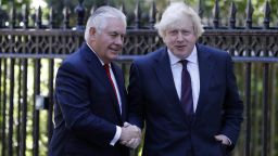 LONDON, ENGLAND - MAY 26: British Foreign Secretary Boris Johnson (R) greets US secretary of state Rex Tillerson, outside Carlton Gardens on May 26, 2017 in London, England.  Rex Tillerson has arrived in London to show support for the UK after the Manchester terrorist attack. (Photo by Adrian Dennis-WPA Pool/Getty Images)