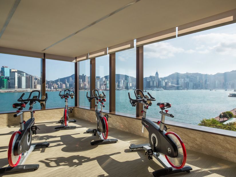 <strong>Kerry Hotel, Hong Kong:</strong> The fourth-floor health club offers top-notch views over the iconic Victoria Harbor and the neon-lit Hong Kong skyline.