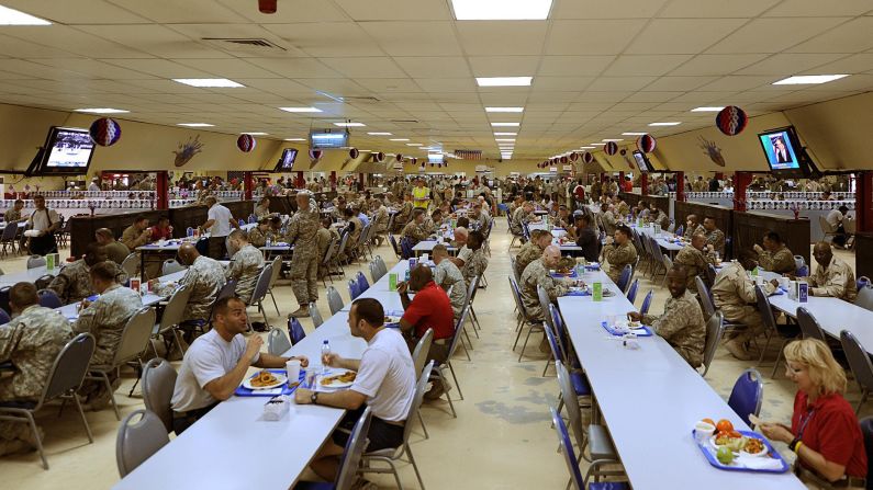 Around the world, US military and civilians can join together in massive mess halls, like this one in Afghanistan, filled with healthy hot and cold meal options. <br />"Military dining facilities are required to provide a large variety of foods," says certified nutrition specialist <a  target="_blank" target="_blank">Patricia Deuster</a>, professor at the Uniformed Services University and author of the first US Navy SEAL Nutrition guide. "You could pick from items such as beef and broccoli stir fry with rice, salads, burgers and fries or a pizza."