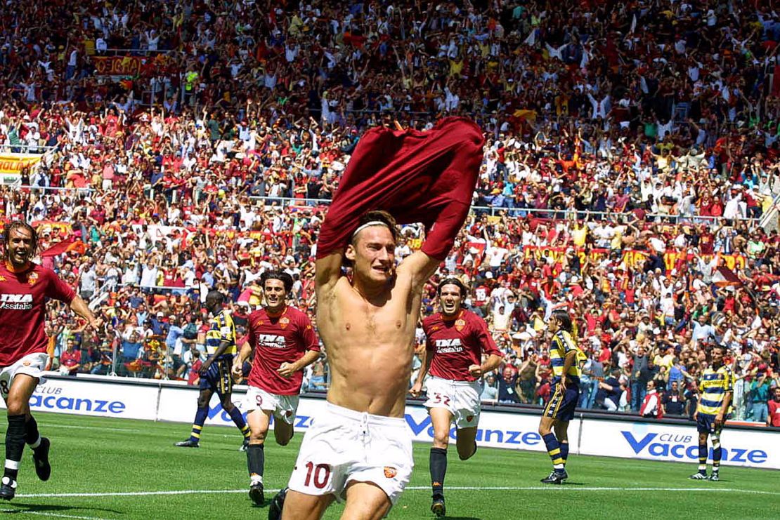 Totti celebrates scoring against parma