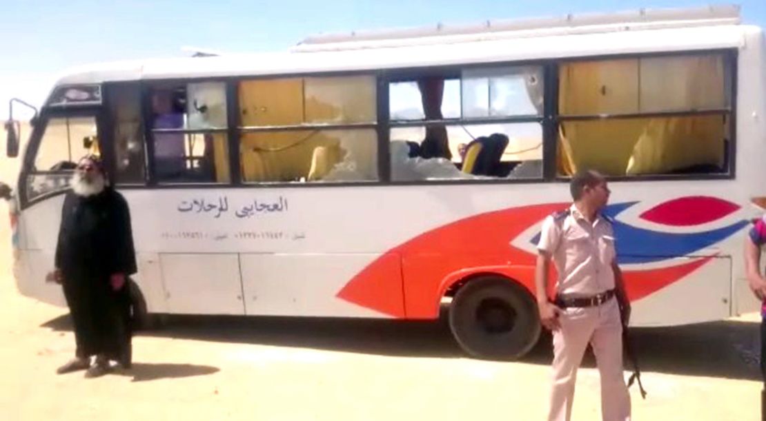 Security officials at the site of the bus attack near Minya on Thursday.