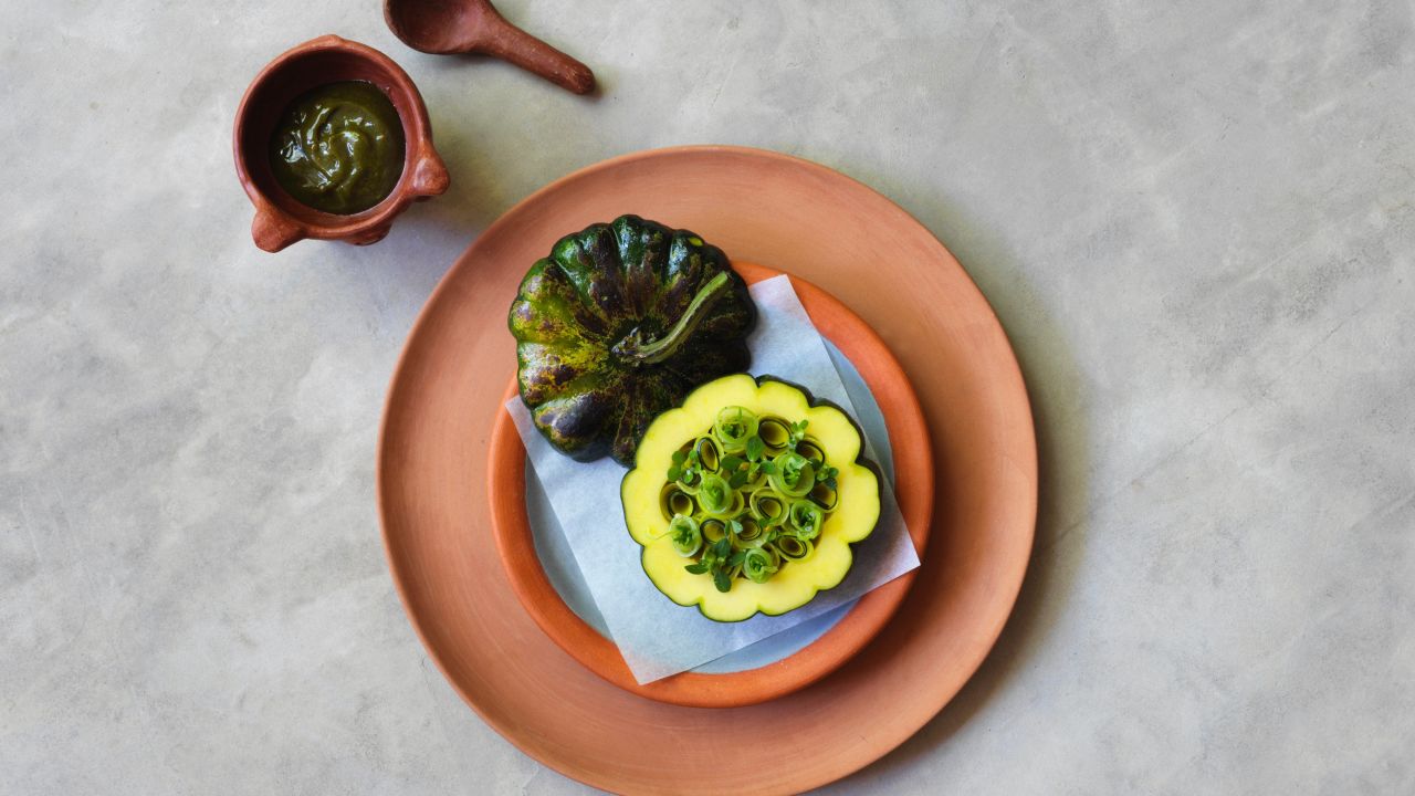 Whole grilled pumpkin with a kelp and avocado fudge