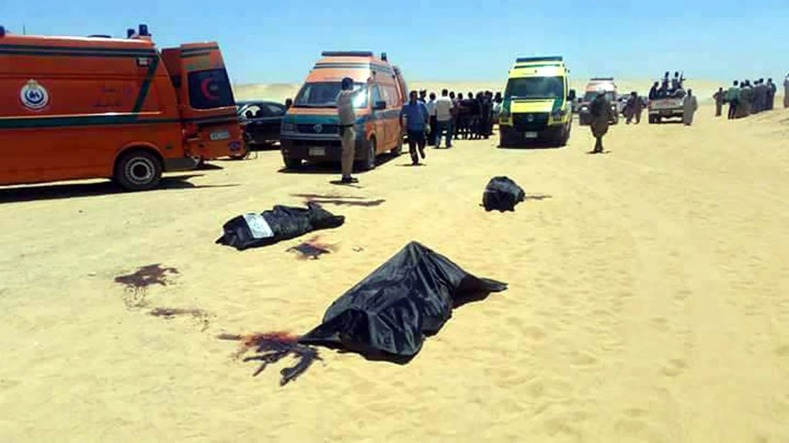 Bodies lie in the desert after the bus attack on Coptic Christians near Minya in Egypt on Thursday.