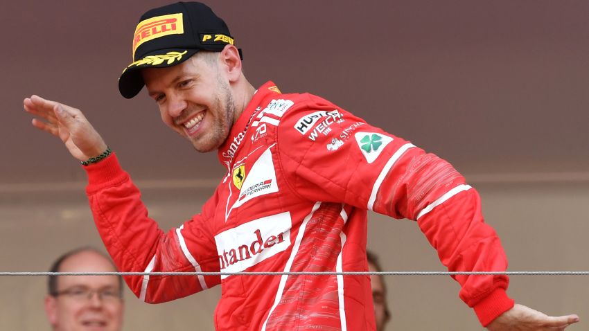 Sebastian Vettel celebrates on the podium after winning the 2017 Monaco Formula 1 Grand Prix.