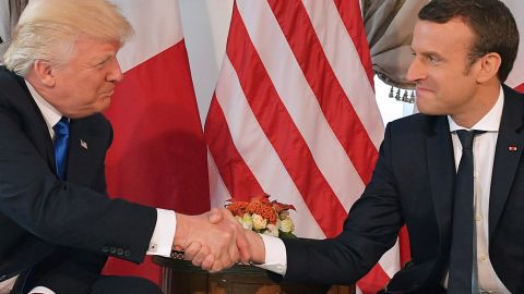 Trump Macron handshake T1