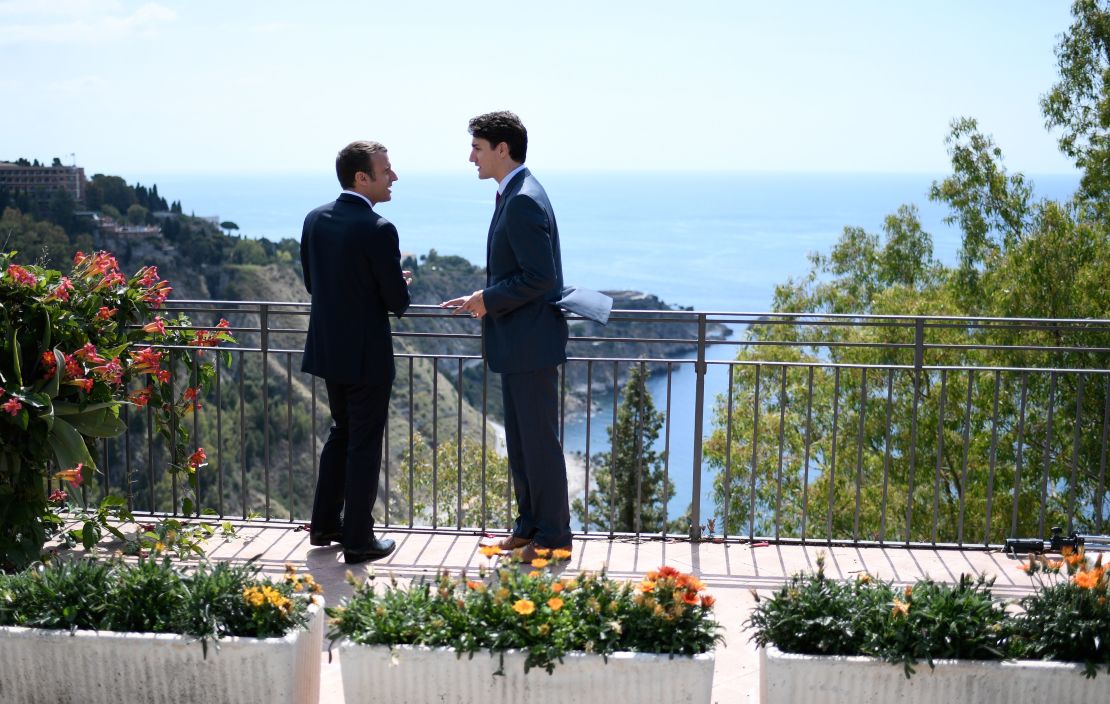 Canadian Prime Minister Justin Trudeau, right, and French President Emmanuel Macron talk in May. 