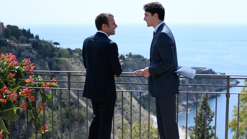 Canadian Prime Minister Justin Trudeau (R) and French President Emmanuel Macron talk as they attend the Summit of the Heads of State and of Government of the G7, the group of most industrialized economies, plus the European Union, on May 26, 2017 in Taormina, Sicily.
The leaders of Britain, Canada, France, Germany, Japan, the US and Italy will be joined by representatives of the European Union and the International Monetary Fund (IMF) as well as teams from Ethiopia, Kenya, Niger, Nigeria and Tunisia during the summit from May 26 to 27, 2017. / AFP PHOTO / POOL / STEPHANE DE SAKUTIN        (Photo credit should read STEPHANE DE SAKUTIN/AFP/Getty Images)