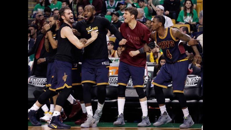 The Cleveland Cavaliers celebrate a basket from the bench during Game 5 of the NBA's Eastern Conference Finals on Thursday, May 25. The Cavaliers blew out Boston to clinch the series and set up <a href="index.php?page=&url=http%3A%2F%2Fwww.cnn.com%2F2017%2F05%2F26%2Fsport%2F2017-nba-finals-preview%2Findex.html" target="_blank">a much-anticipated rematch</a> with the Golden State Warriors.