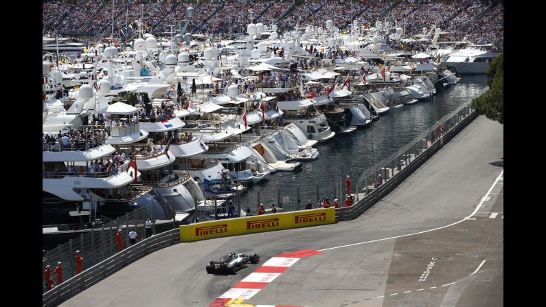 People watch <a href="index.php?page=&url=http%3A%2F%2Fwww.cnn.com%2F2017%2F05%2F28%2Fmotorsport%2Fsebastian-vettel-ferrari-monaco-grand-prix%2Findex.html" target="_blank">the Monaco Grand Prix</a> from boats on Sunday, May 28.