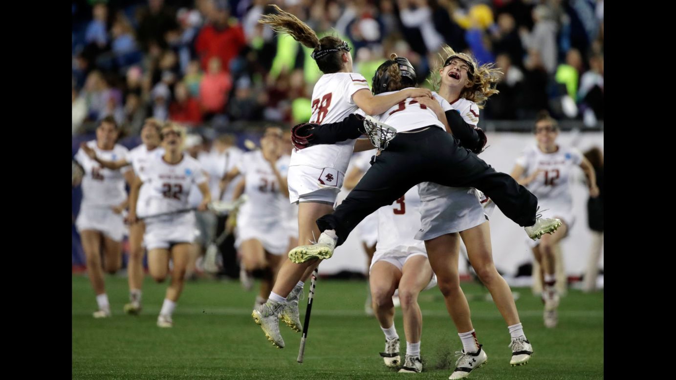 Boston College lacrosse players celebrate after winning their NCAA semifinal against Navy on Friday, May 26.