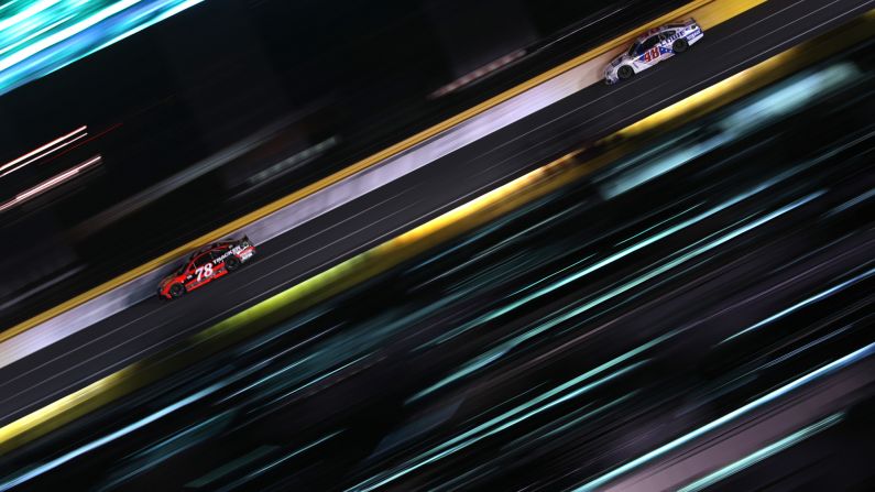 Martin Truex Jr. leads Jimmie Johnson during the NASCAR Cup Series race at Charlotte Motor Speedway on Sunday, May 28. <a href="index.php?page=&url=http%3A%2F%2Fwww.cnn.com%2F2017%2F05%2F22%2Fsport%2Fgallery%2Fwhat-a-shot-sports-0523%2Findex.html" target="_blank">See 31 amazing sports photos from last week</a>