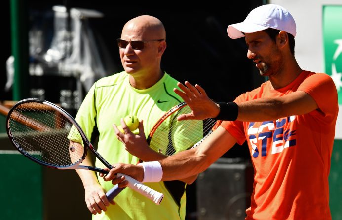 But it's so far so good for Djokovic-Agassi... <a href="index.php?page=&url=https%3A%2F%2Ftwitter.com%2Fcnnsport" target="_blank" target="_blank"><strong>Who will win the French Open?</strong><em> Have your say tweeting @CNNSport. </em></a>