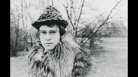 John appears in one of his first publicity photos in 1968. The singer had officially changed his name to Elton John a year earlier after being born as Reginald Kenneth Dwight in Pinner, England, in 1947. The name was inspired by members of his early band, Bluesology, whose saxophone player was Elton Dean and lead singer was Long John Baldry.