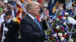 President Donald Trump arrives to lay a wreath at the Tomb of the Unknowns at Arlington National Cemetery to mark Memorial Day in Arlington, Virginia, on May 29, 2017.