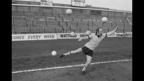 John is overwhelmed by multiple shots on goal while playing around at Watford's stadium in 1974.
