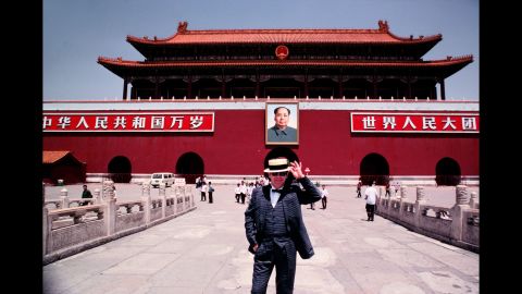 John stands in Tiananmen Square while touring Beijing in 1983.
