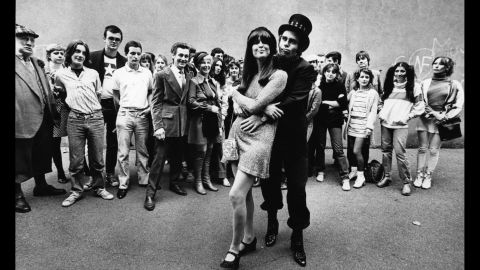 Fans watch John embrace singer and friend Kiki Dee in 1978. The two had a No. 1 hit, "Don't Go Breaking My Heart," in 1976.