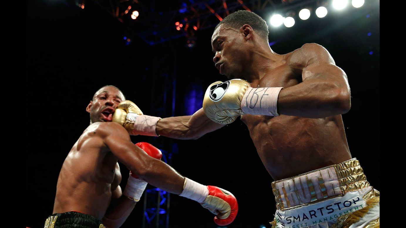 Errol Spence Jr. punches Kell Brook during their welterweight title fight in Sheffield, England, on Saturday, May 27. Spence won after the fight was stopped in the 11th round.