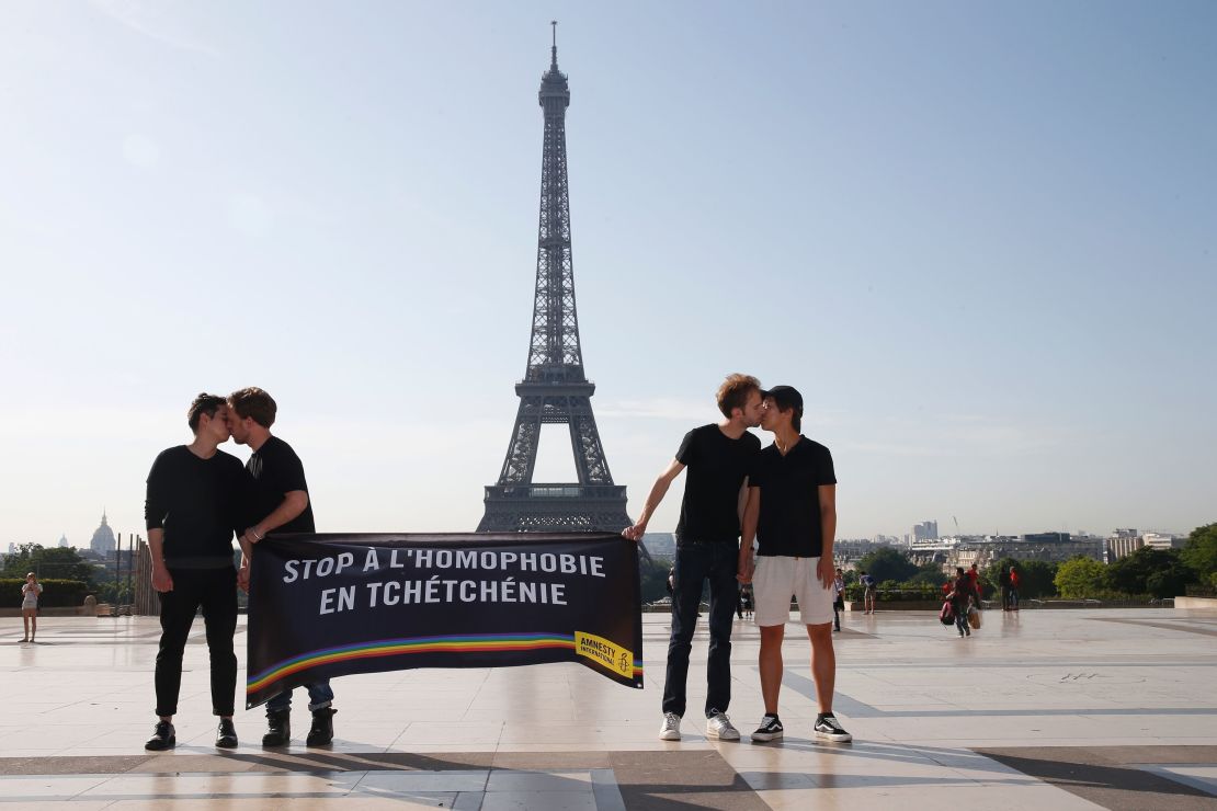 Gay rights activists protest against persecution of LGBT people in Chechnya in Paris on Monday.