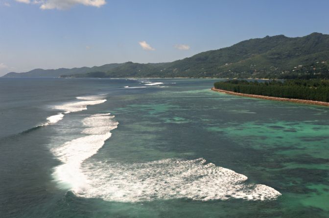 Waves break over coral reef off the coast of Mahe, the largest island of the Seychelles. <br /><br />The archipelago is among the African states with abundant, relatively untapped marine resources. 