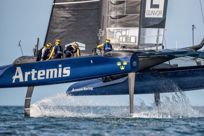 <strong>Artemis Racing: </strong>"It is very hard to shoot these boats as they are traveling over 40 knots. Normally you are always following the boats around as it is hard to predict where they will be, so you can't set up a shot somewhere ahead as they might never come your way. In this case I was on one of the team chase boats with all the coaches and performance analyzers. I always like to shoot the action through the gybes [turning maneuver where stern passes through wind]<strong> </strong>as you see the boards splashing down in the water. The high shutter speed freezes the water and makes for some nice details behind the foil and the rudder" -- Sander Van der Borch.